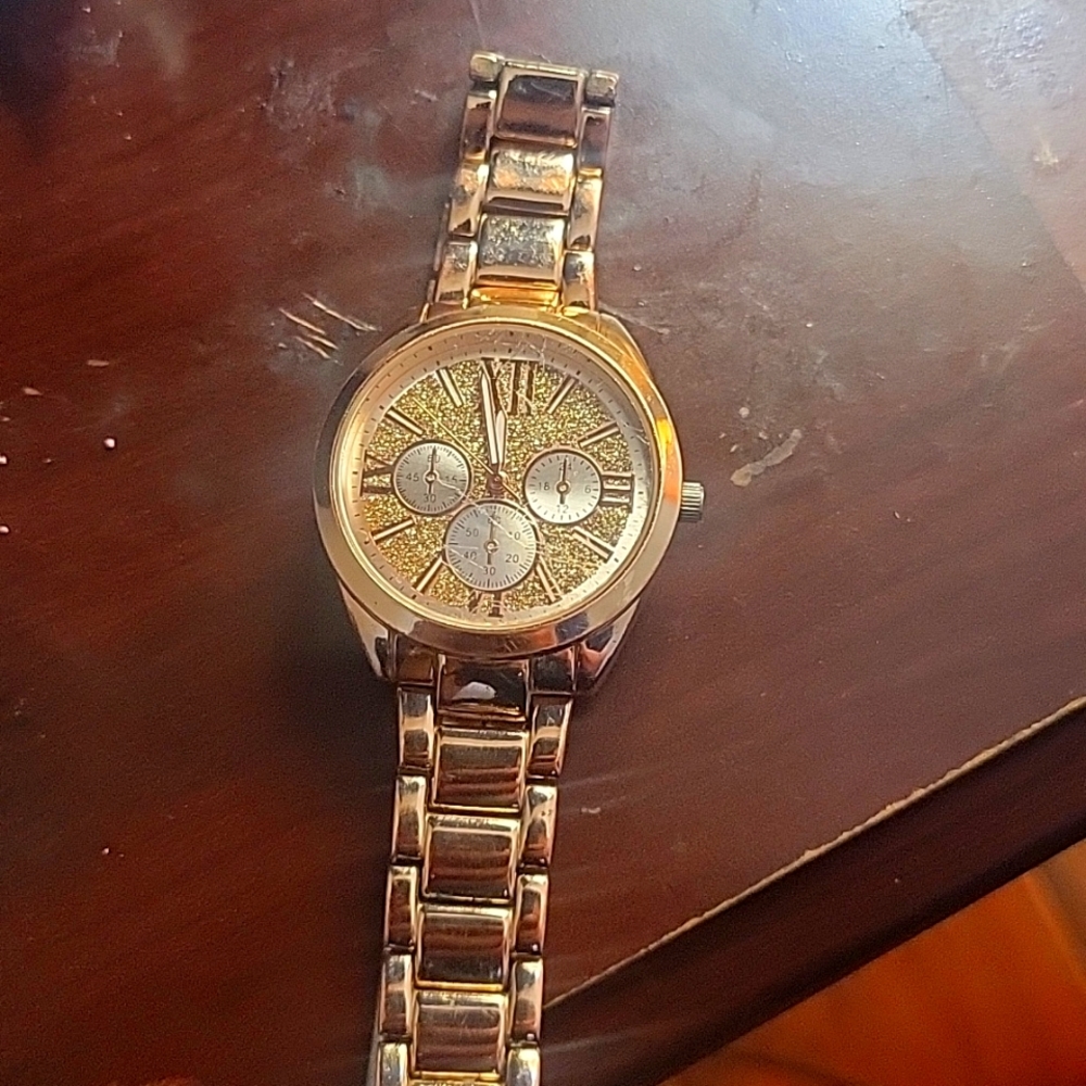 Accutime rose gold women's watch